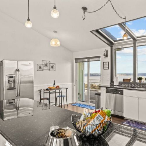 Meal prep is a breeze in the fully equipped Chef's Kitchen with Stainless Steel appliances, 4-slice toaster, blender, spices, kitchen knives, olive oil, sea salt & pepper grinders