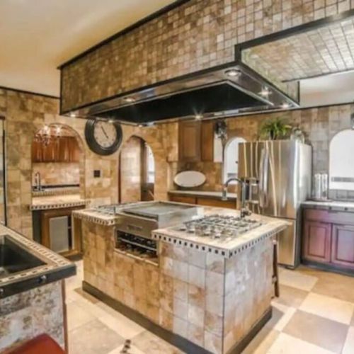 Large kitchen with plenty of space to gather in while cooking and baking family favorites. This culinary sanctuary is a haven for gastronomic adventures...