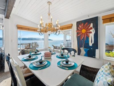 Indulge in a sumptuous dining experience with your loved ones in a dining room that frames the ocean like a living masterpiece.