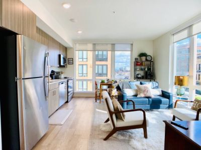Full view of the open living space: kitchen, dining, and living room.