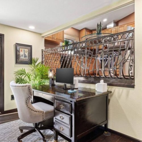 Boost your productivity in this dedicated workspace, thoughtfully designed to cater to your professional needs. Stay organized and inspired in this designated area, ensuring you have a productive and inspiring work-from-home experience.