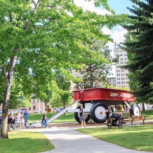 Riverfront Park-The Red Wagon Meadow is home to one of Spokane’s most cherished pieces of public art–The Childhood Express. The sculpture is a 12-foot-high, 12-foot-wide, and 27-foot-long. Kids enjoy the play structure with monkey bars and a slide.