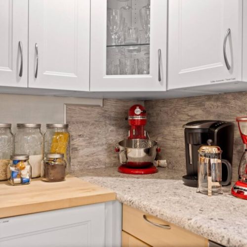Savor your perfect cup of coffee with this coffee lover's dream setup featuring a Keurig reusable K-Cup system, a 12-cup coffee maker, and a classic French press.