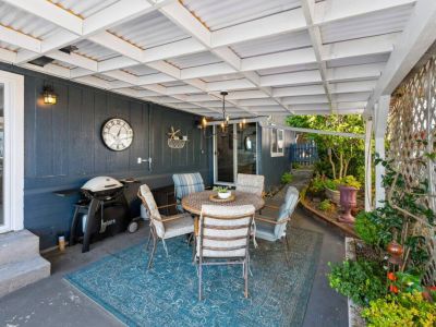 Our covered patio with grill that will delight any barbecue enthusiast rain or shine.