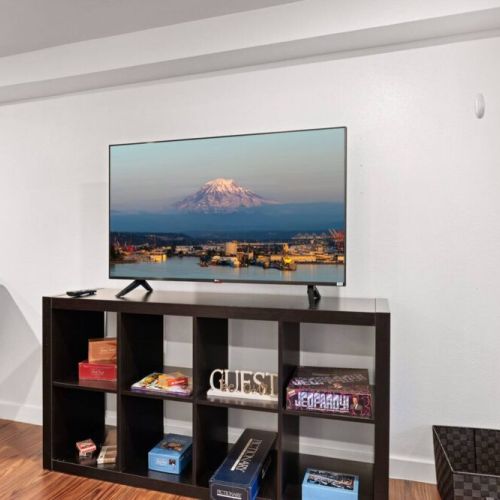 The comfortable ambiance of the room invites you to unwind and enjoy a leisurely viewing experience. Relax and watch your favorite shows.