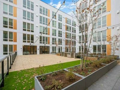 From the lush greenery of parks to the reflections in glass facades, the cityscape exudes a sense of vitality and urban life