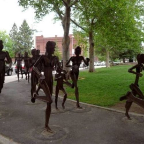 Riverfront Park-The Joy of Running Together is comprised of 40 life-sized figures, all posed in the motion of running.