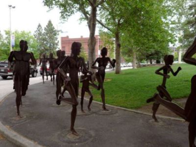 Riverfront Park-The Joy of Running Together is comprised of 40 life-sized figures, all posed in the motion of running.