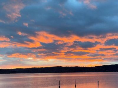 Guest photo of a sunset from Sand Dollar Beach Cottage. 

Photo credit: D. Grant