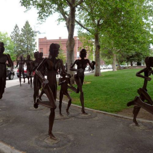 Riverfront Park-The Joy of Running Together is comprised of 40 life-sized figures, all posed in the motion of running.