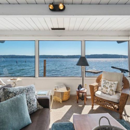 As you gaze out through the window, the rhythmic sound of waves crashing against the shore provides a soothing soundtrack to your relaxation...