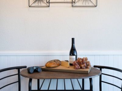 The café nook is perfect for storing wine on the rack, additional serving space or additional dining seating.