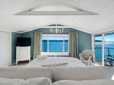 Imagine waking up in a tranquil oasis where the first thing you see is the vast expanse of the ocean stretching out before you.